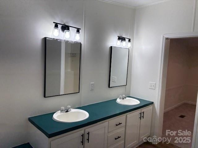 bathroom featuring double vanity and a sink