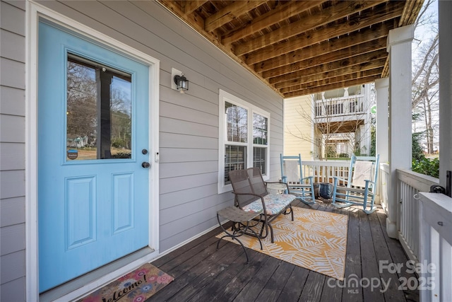 wooden terrace with covered porch