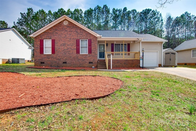 ranch-style house featuring a garage, driveway, a porch, crawl space, and central AC unit