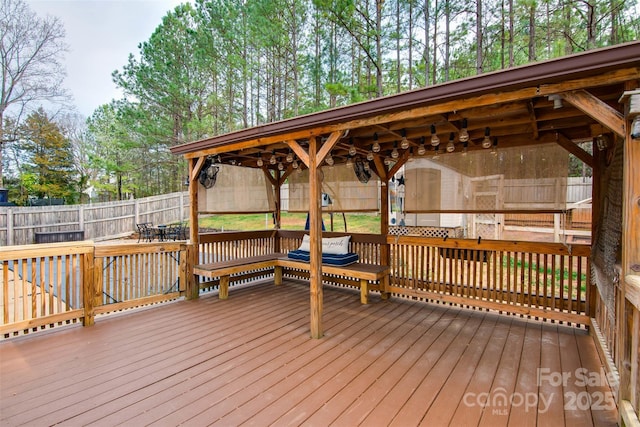 deck featuring fence