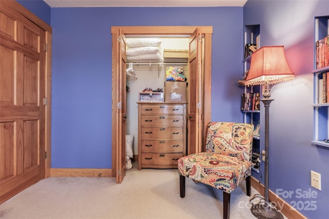 sitting room with carpet flooring