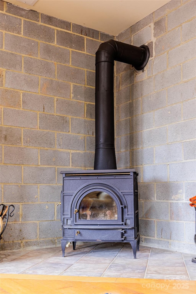 room details featuring a wood stove