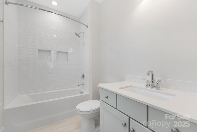 full bathroom with vanity, shower / bathing tub combination, and toilet