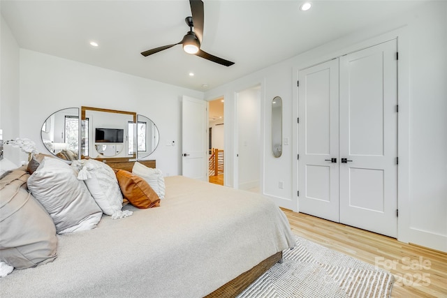 bedroom with recessed lighting, light wood-style flooring, baseboards, and ceiling fan