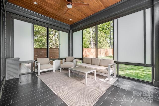 sunroom / solarium with outdoor lounge area and ceiling fan