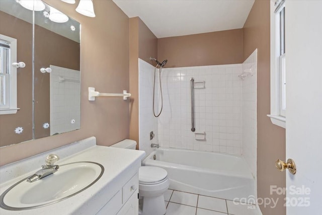 full bathroom featuring tile patterned floors, vanity, toilet, and shower / bathing tub combination