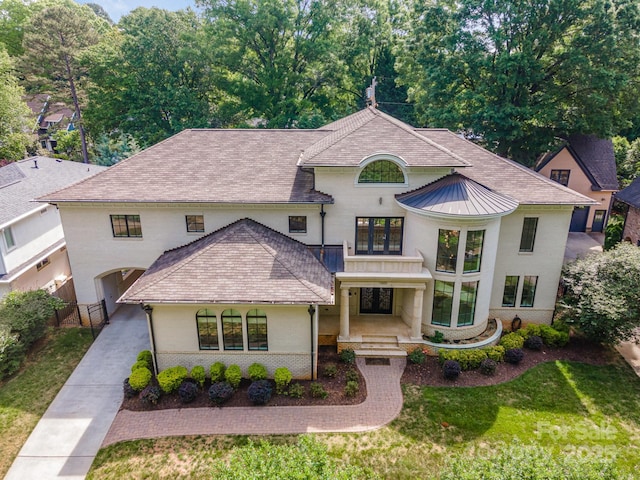 1665 Sterling Rd, Charlotte, NC 28209 - french country inspired facade with a front lawn, a standing seam roof, and metal roof