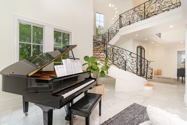 1665 Sterling Rd, Charlotte, NC 28209 - stairway featuring a towering ceiling and recessed lighting