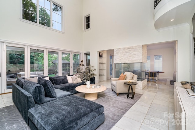 1665 Sterling Rd, Charlotte, NC 28209 - living room featuring built in features and a high ceiling