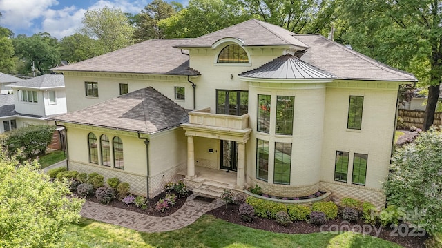 1665 Sterling Rd, Charlotte, NC 28209 - french country inspired facade featuring brick siding and roof with shingles