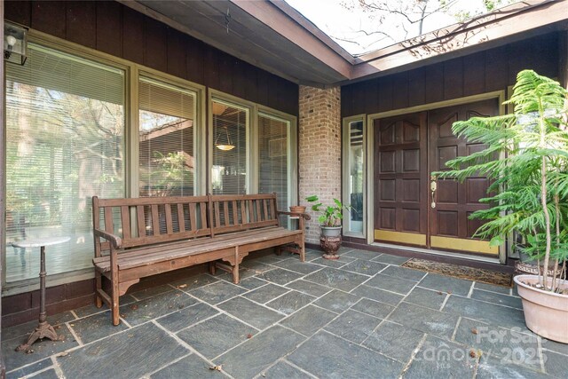 32 Fairway Rdg, Lake Wylie, SC 29710 - doorway to property featuring board and batten siding