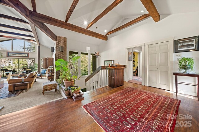32 Fairway Rdg, Lake Wylie, SC 29710 - interior space featuring beam ceiling, an upstairs landing, wood finished floors, and high vaulted ceiling