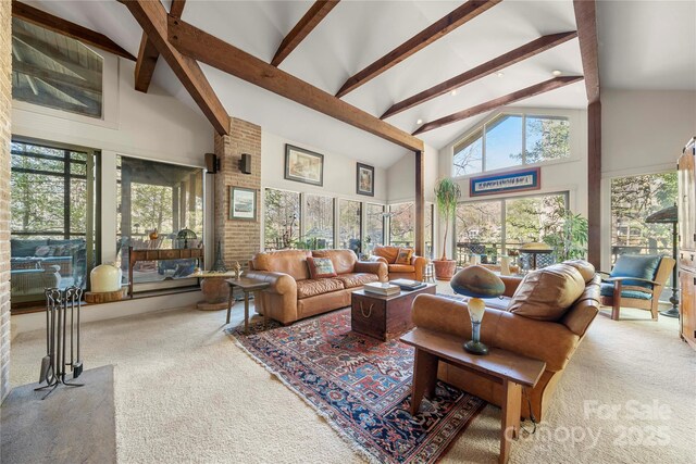 32 Fairway Rdg, Lake Wylie, SC 29710 - carpeted living area featuring a wealth of natural light, beamed ceiling, and high vaulted ceiling