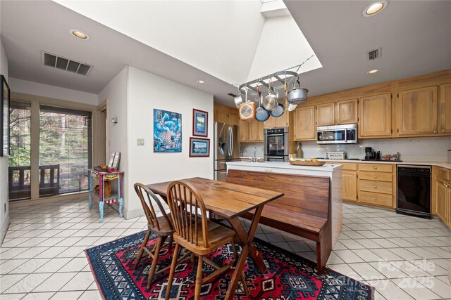 32 Fairway Rdg, Lake Wylie, SC 29710 - kitchen featuring light tile patterned floors, visible vents, appliances with stainless steel finishes, and light countertops