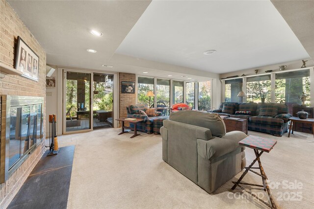 32 Fairway Rdg, Lake Wylie, SC 29710 - living area with a brick fireplace, recessed lighting, french doors, and light carpet