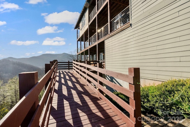 view of property exterior with a mountain view