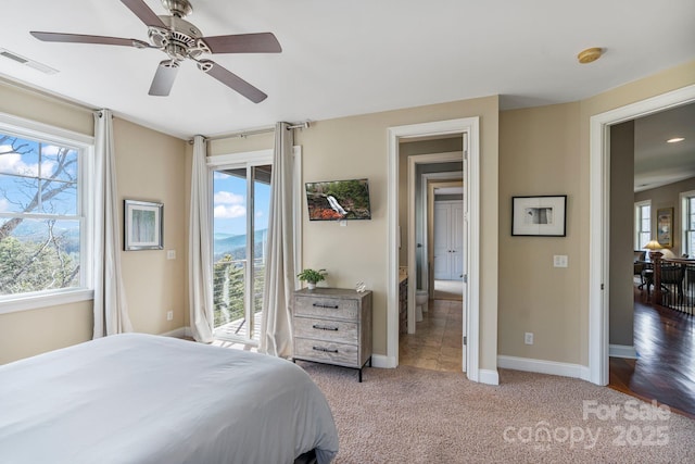 bedroom featuring visible vents, access to outside, carpet, baseboards, and ceiling fan