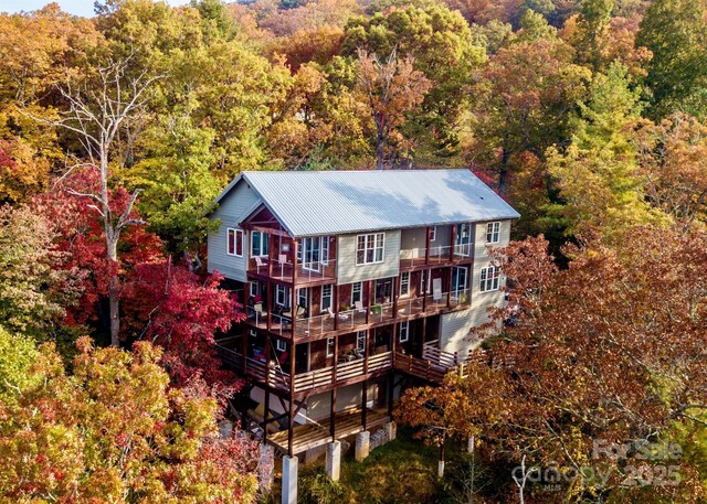 bird's eye view featuring a view of trees