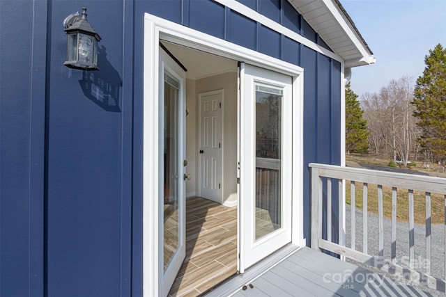property entrance with board and batten siding