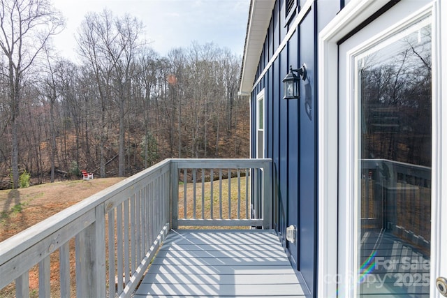 balcony with a forest view