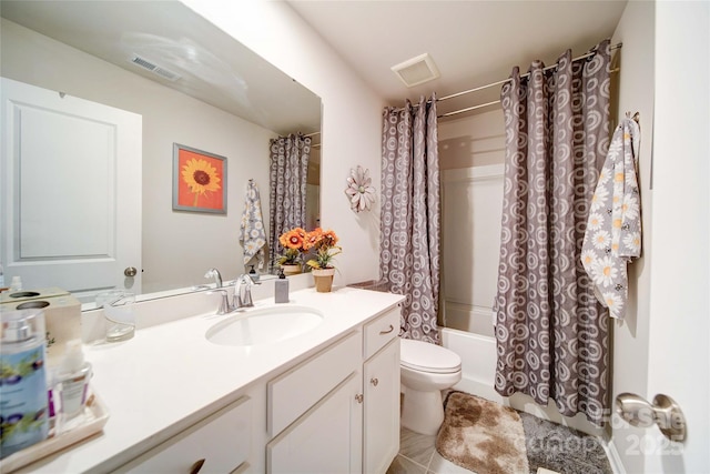full bath featuring vanity, toilet, shower / bath combo with shower curtain, and visible vents