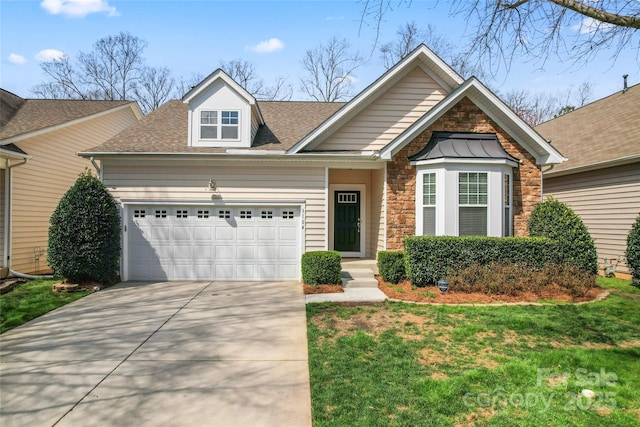 3104 Streamhaven Dr, Indian Land, SC 29707 - view of front of property with roof with shingles, an attached garage, concrete driveway, a front lawn, and stone siding
