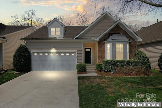 3104 Streamhaven Dr, Indian Land, SC 29707 - view of front facade featuring concrete driveway, a yard, a garage, and a shingled roof
