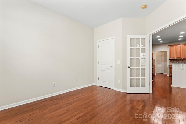 3104 Streamhaven Dr, Indian Land, SC 29707 - spare room featuring dark wood finished floors, recessed lighting, baseboards, and french doors