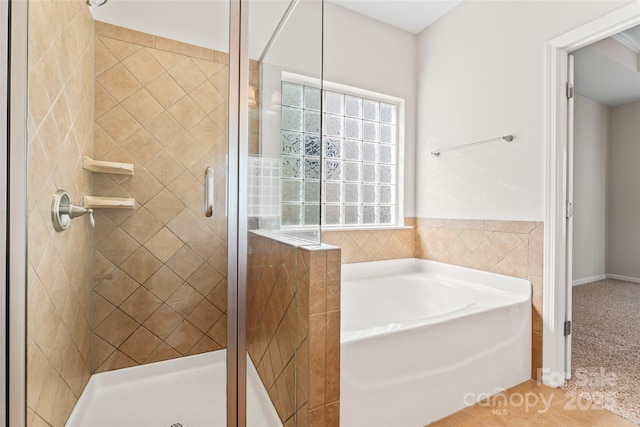 3104 Streamhaven Dr, Indian Land, SC 29707 - bathroom featuring a garden tub and a stall shower