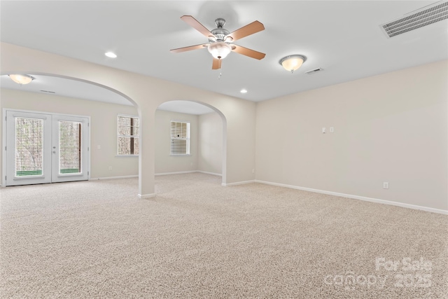 3104 Streamhaven Dr, Indian Land, SC 29707 - carpeted empty room featuring visible vents, a ceiling fan, recessed lighting, arched walkways, and baseboards