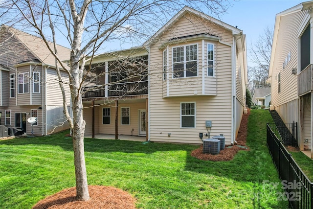 3104 Streamhaven Dr, Indian Land, SC 29707 - back of house featuring a patio, central air condition unit, a yard, and fence