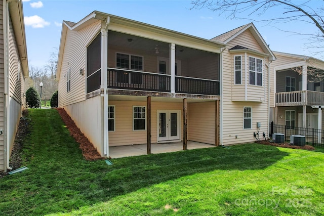 3104 Streamhaven Dr, Indian Land, SC 29707 - back of house featuring a yard, french doors, a patio, and a sunroom