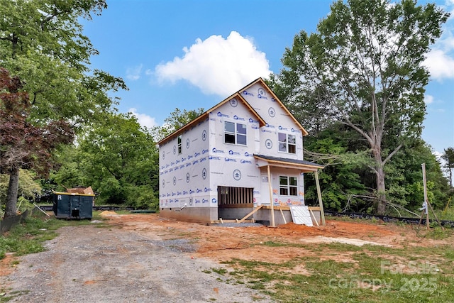 5005 County Home Rd, Conover, NC 28613 - property under construction with view of wooded area