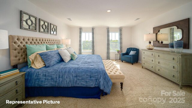 bedroom featuring light carpet, visible vents, and baseboards