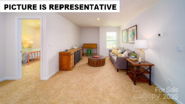 living area featuring recessed lighting, baseboards, and carpet floors