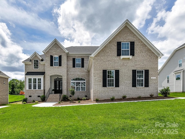 873 Penny Royal Ave, Fort Mill, SC 29715 - view of front of house featuring brick siding, a front yard, crawl space, and french doors