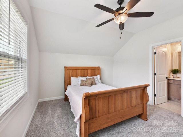 873 Penny Royal Ave, Fort Mill, SC 29715 - carpeted bedroom with vaulted ceiling, multiple windows, ensuite bathroom, and ceiling fan