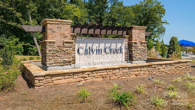 view of community sign