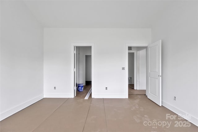 8455 W NC-152 Hwy, Mooresville, NC 28115 - unfurnished bedroom with finished concrete flooring and a spacious closet