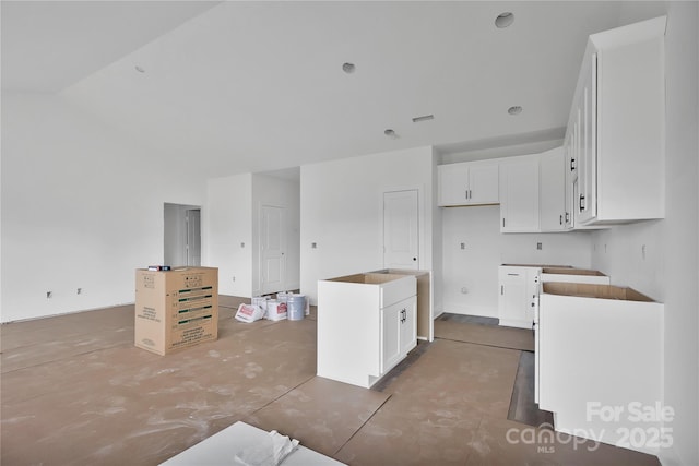 8455 W NC-152 Hwy, Mooresville, NC 28115 - kitchen with white cabinetry and a center island