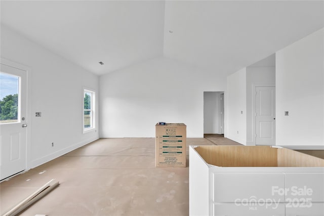 8455 W NC-152 Hwy, Mooresville, NC 28115 - unfurnished living room with lofted ceiling and baseboards