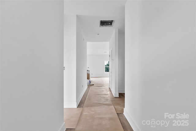 8455 W NC-152 Hwy, Mooresville, NC 28115 - hallway featuring baseboards and concrete floors