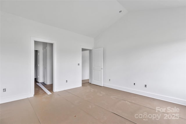 8455 W NC-152 Hwy, Mooresville, NC 28115 - unfurnished bedroom featuring baseboards and high vaulted ceiling