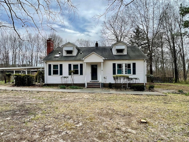 10516 Hambright Rd, Huntersville, NC 28078 - view of front facade with a chimney