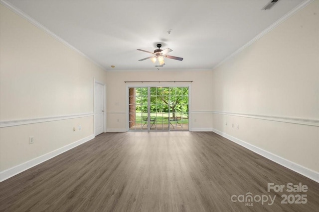 unfurnished room featuring a ceiling fan, ornamental molding, and baseboards