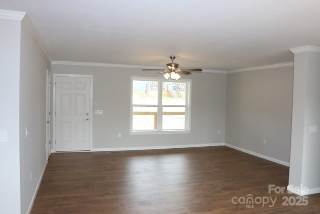 unfurnished room with crown molding, baseboards, dark wood-style flooring, and ceiling fan