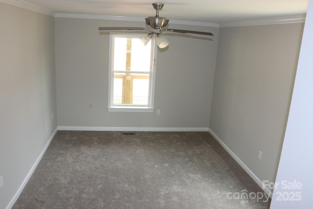 spare room featuring ceiling fan, baseboards, carpet, and ornamental molding