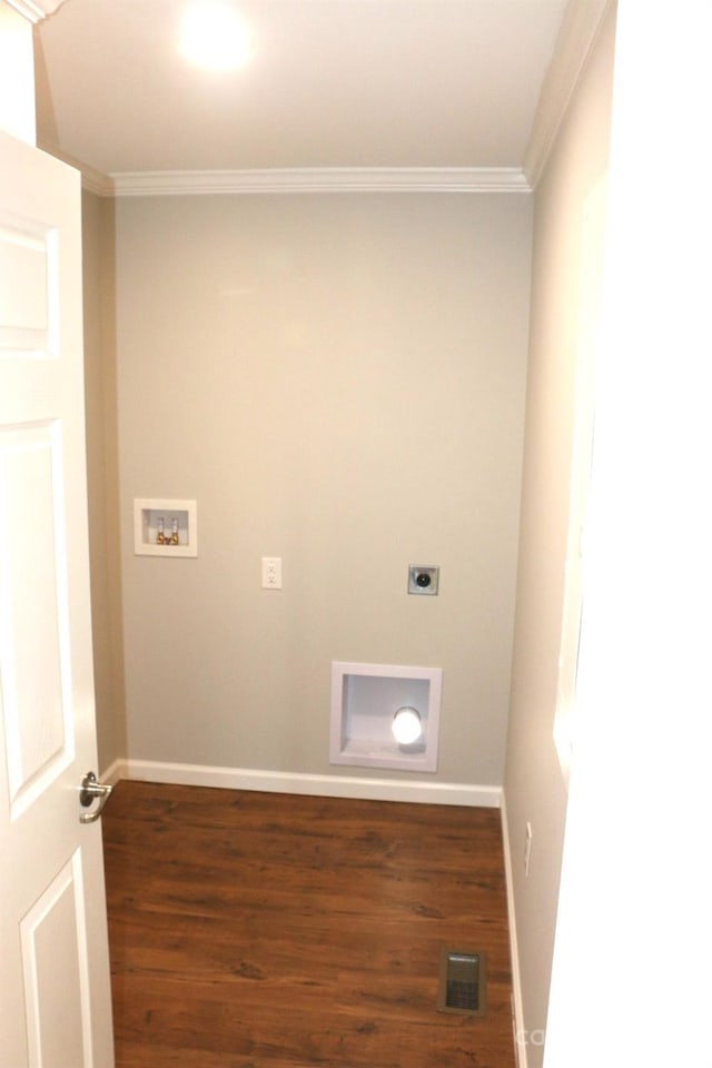 laundry room featuring electric dryer hookup, visible vents, washer hookup, and crown molding