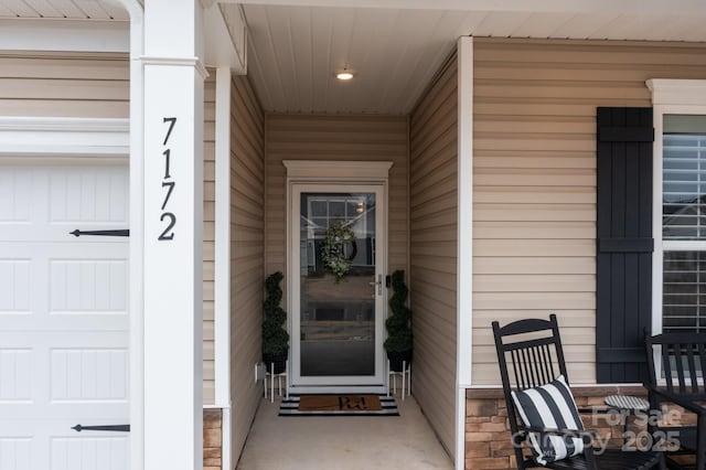 7172 Indigo Way, Denver, NC 28037 - property entrance with a garage