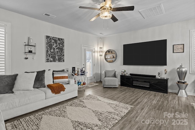 7172 Indigo Way, Denver, NC 28037 - living area with wood finished floors, ceiling fan, and baseboards